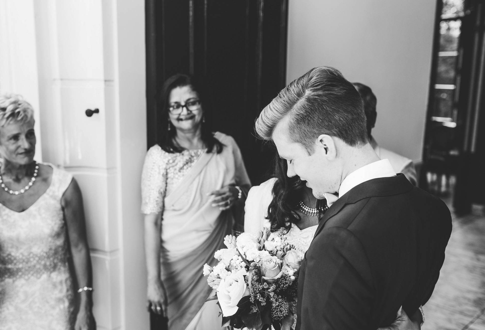 Wedding Photography Amsterdam - Groom picking up his bride