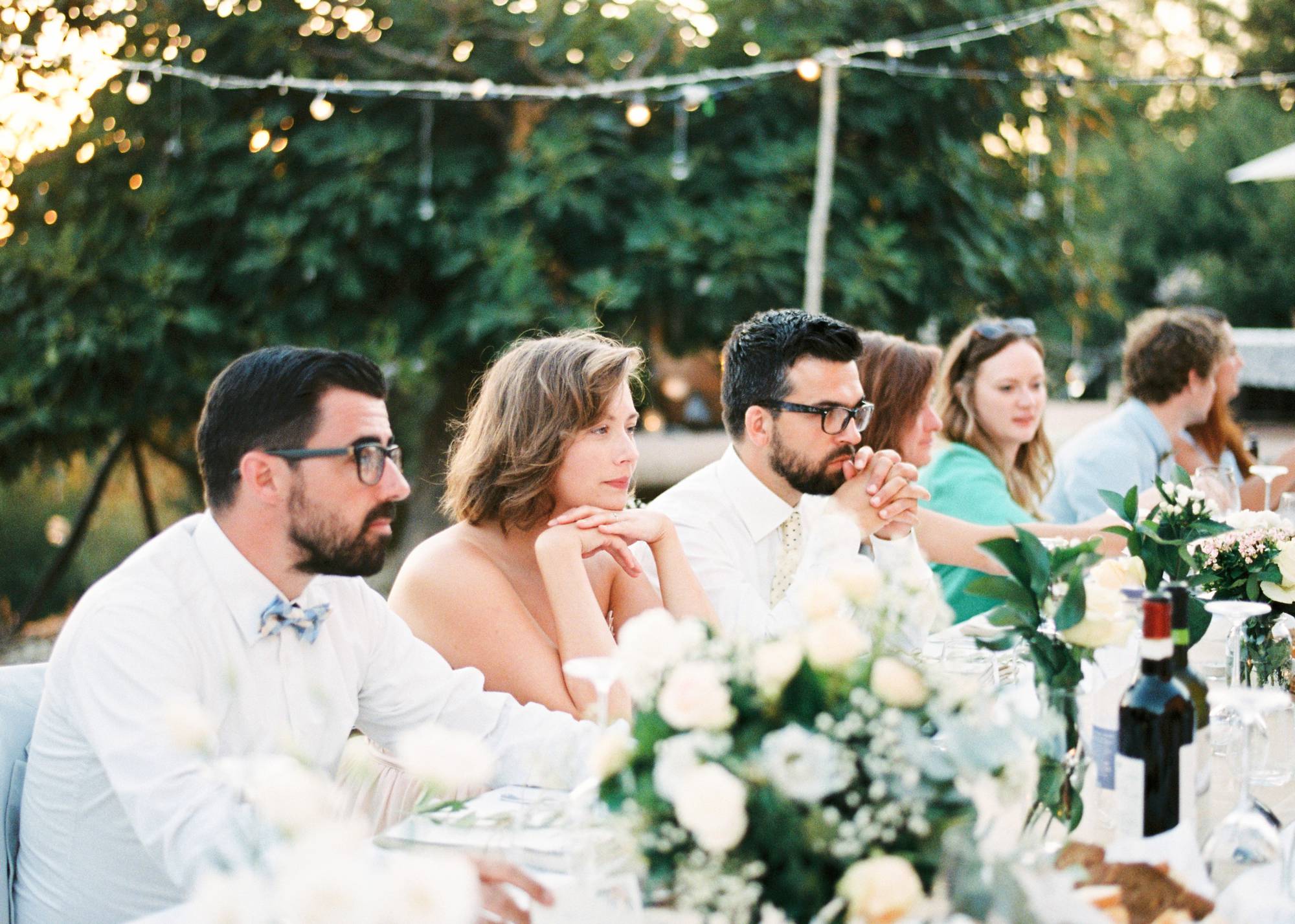 Fine art film photography Destination Wedding Tuscany Italy - Guests at wedding table