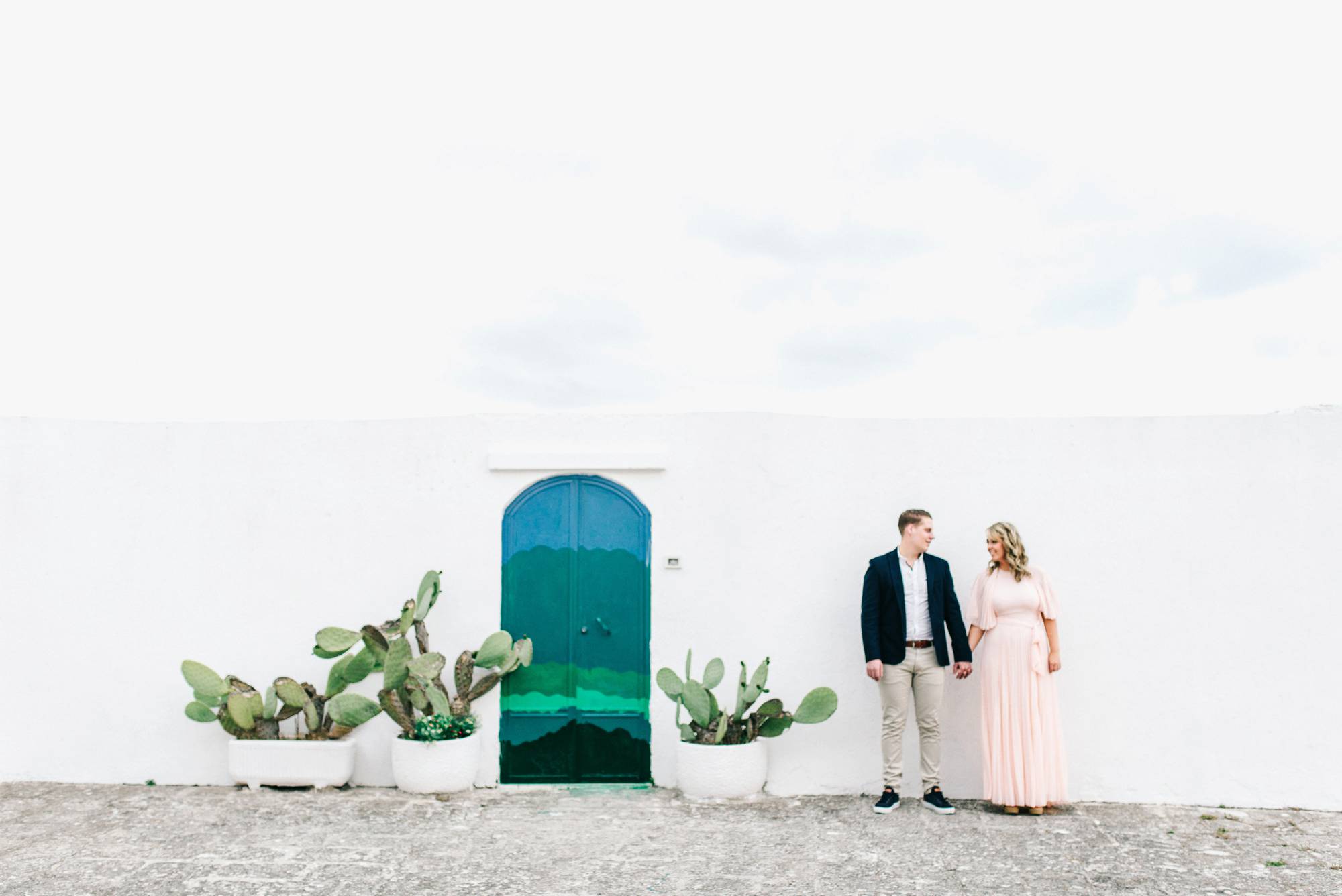 Fine art film photography Engagement shoot Ostuni Puglia Italy - Romantic couple shout