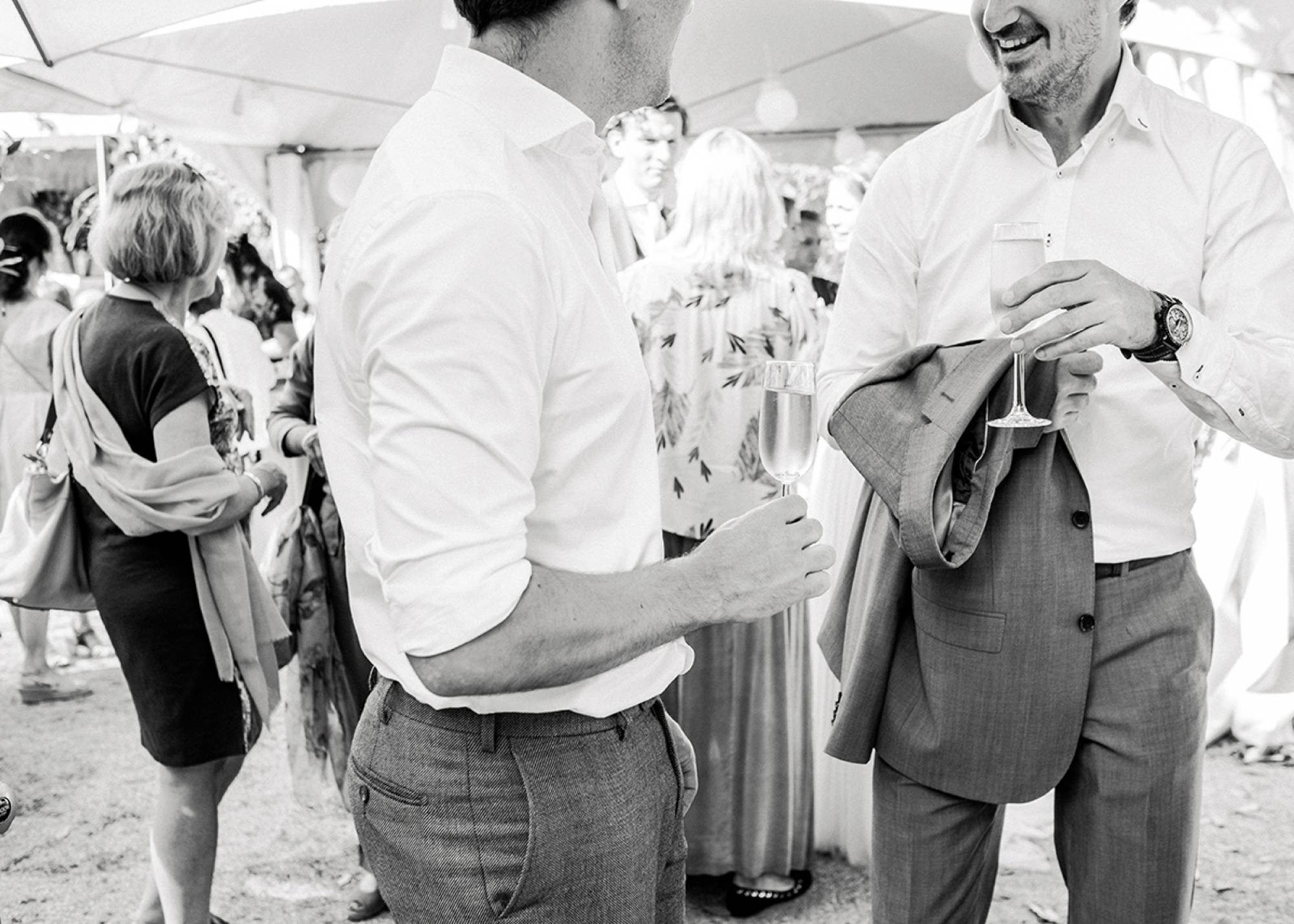 Fine art film photographer Amsterdam the Netherlands - Wedding guests laughing