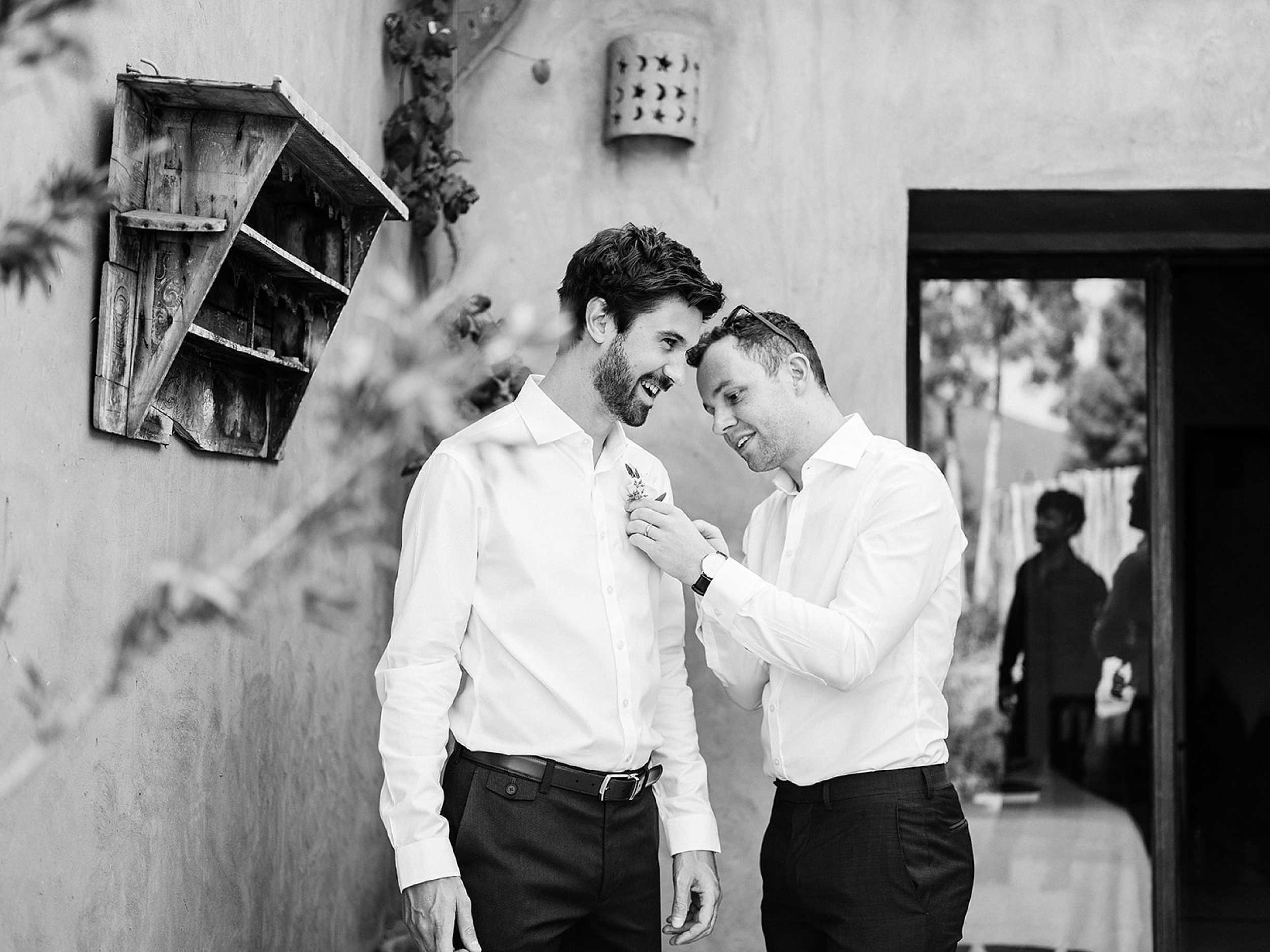 Andrew the groom getting ready for his intimate wedding in the mountains of Morocco // Raisa Zwart Photography