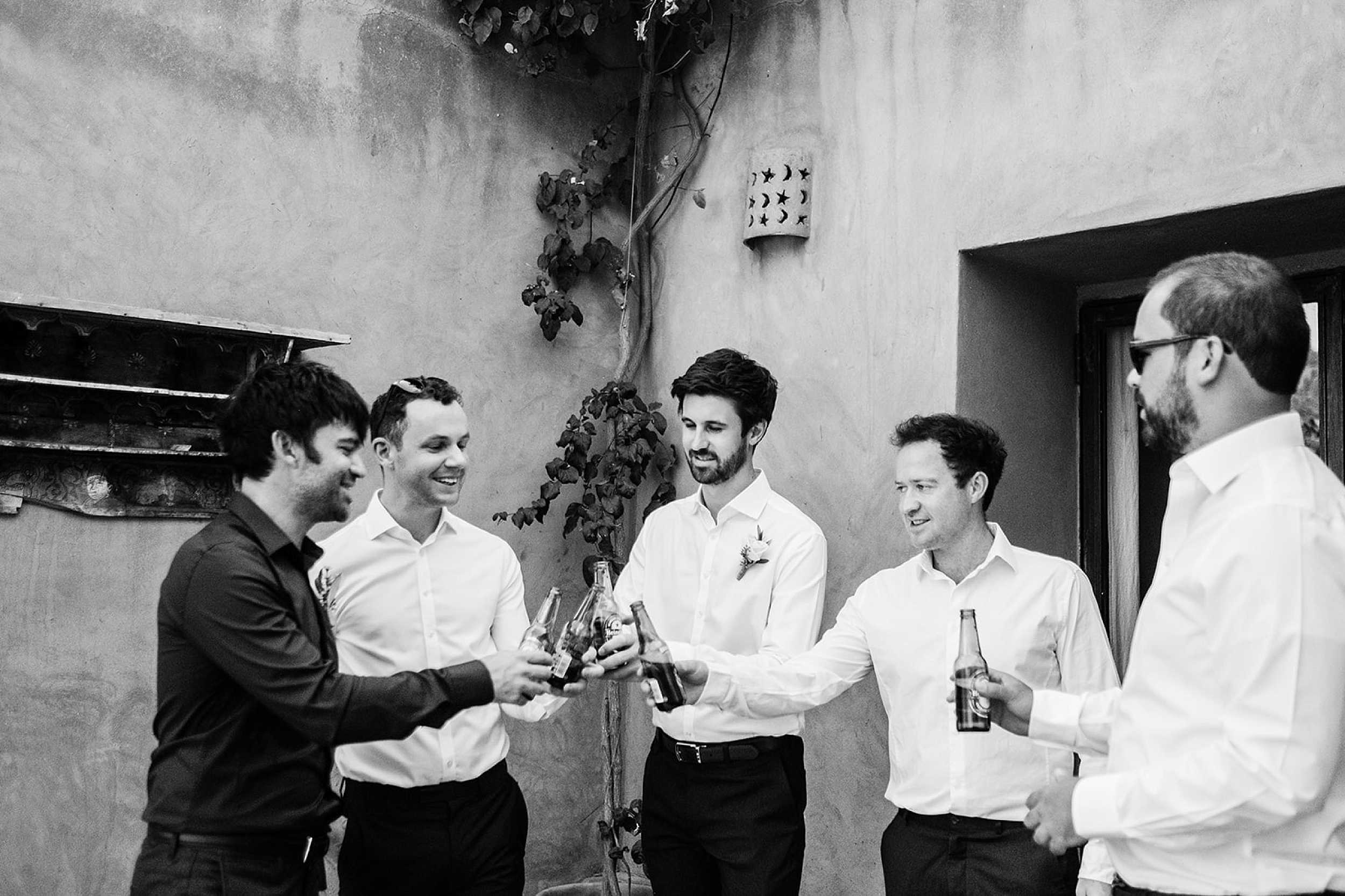 Andrew and his groomsmen getting ready for his intimate wedding in the mountains of Morocco // Raisa Zwart Photography